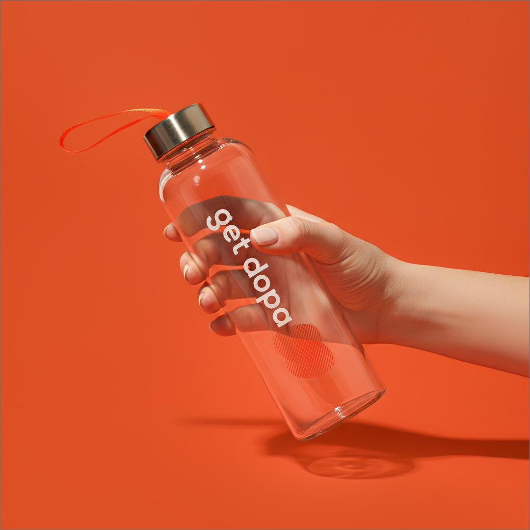 hand holding water bottle 