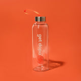 water bottle on orange background